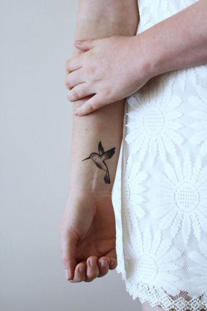 Imagem mostra tattoo no pulso
