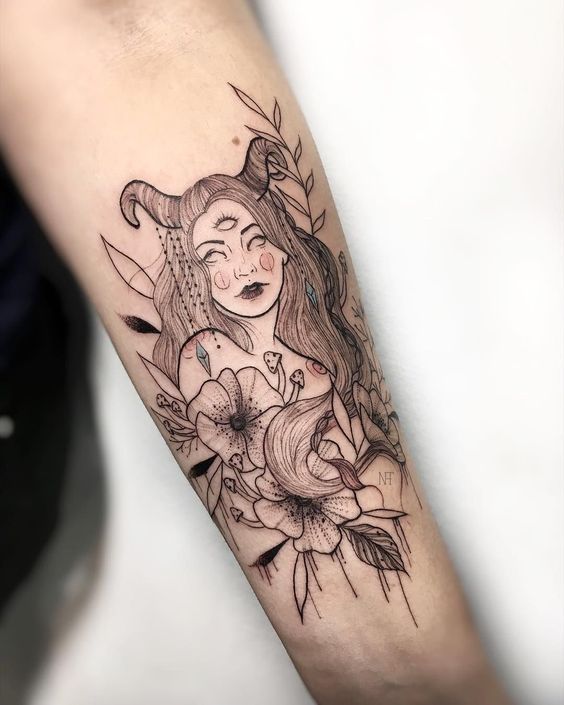 Imagem mostra tatuagem feminina no braço