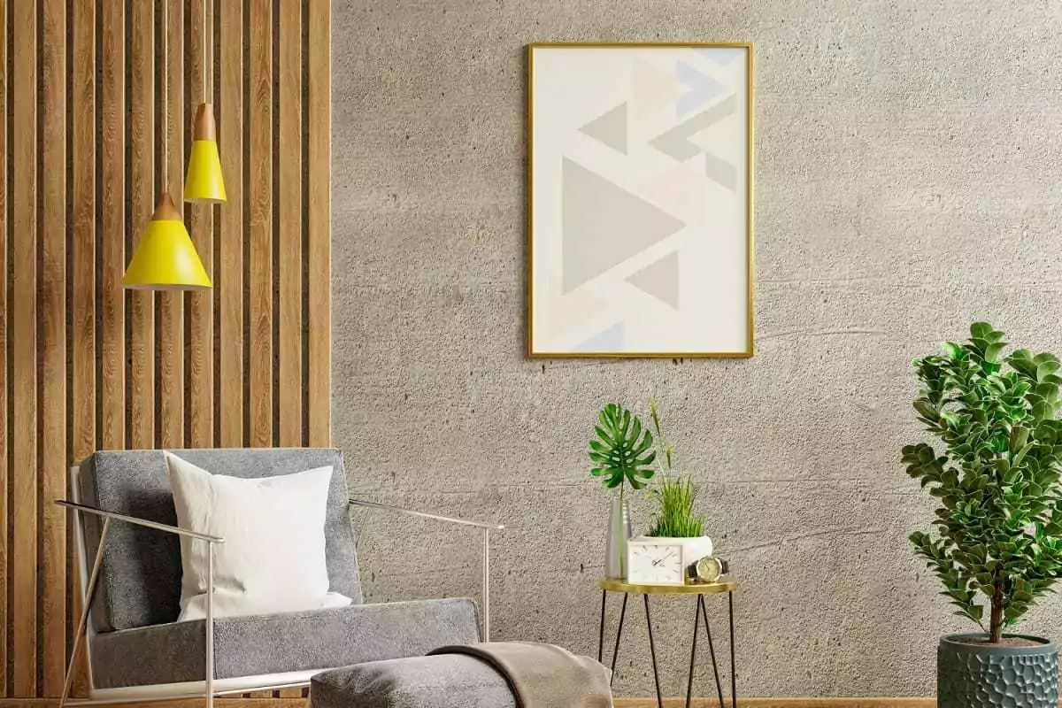 imagem de uma sala decorada com quadro, vasos e uma poltrona